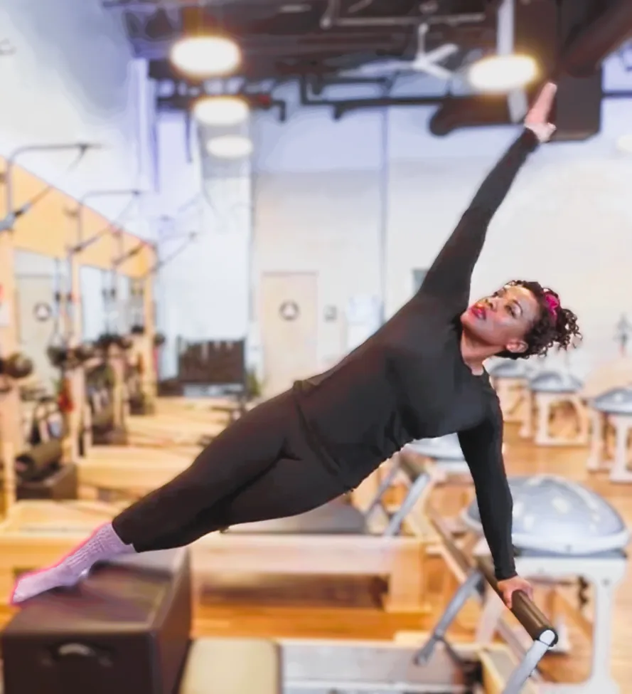 Karena coaching a private reformer training session